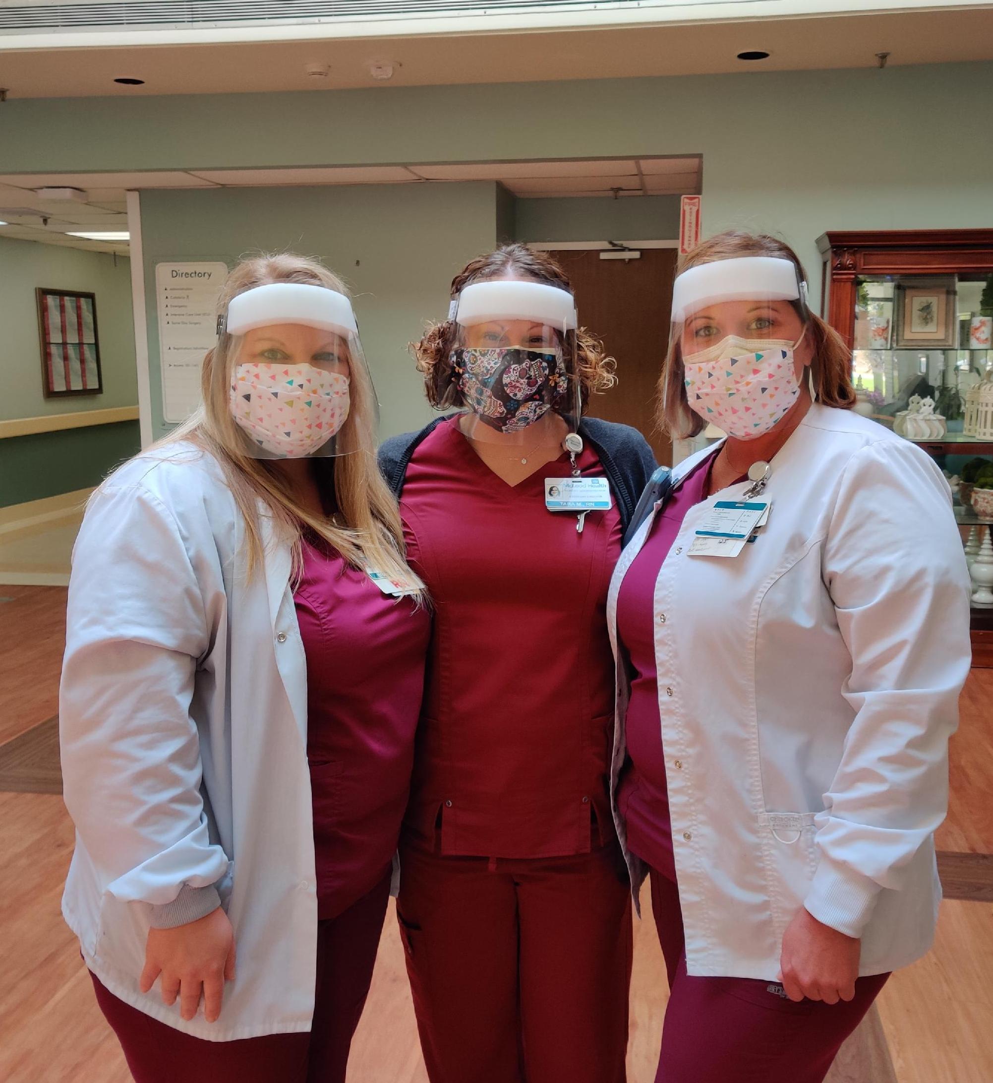 picture of hospital workers in masks.